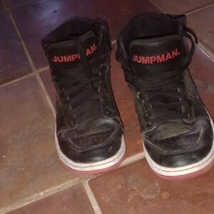 Nike Black Sneakers with Red Jumpman Logo